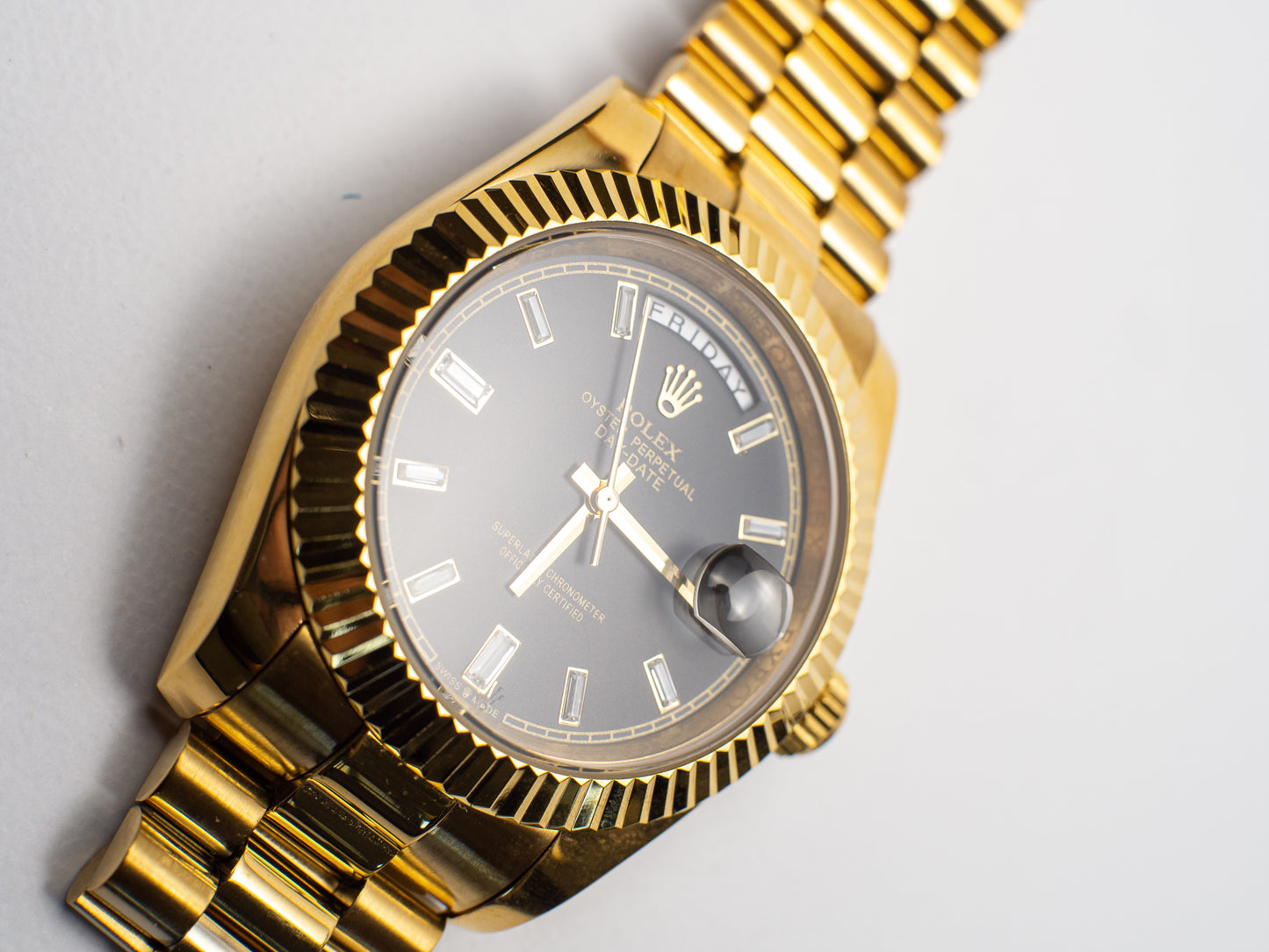 Rolex Day-Date "President" – Esfera Negra con Diamantes Baguette
